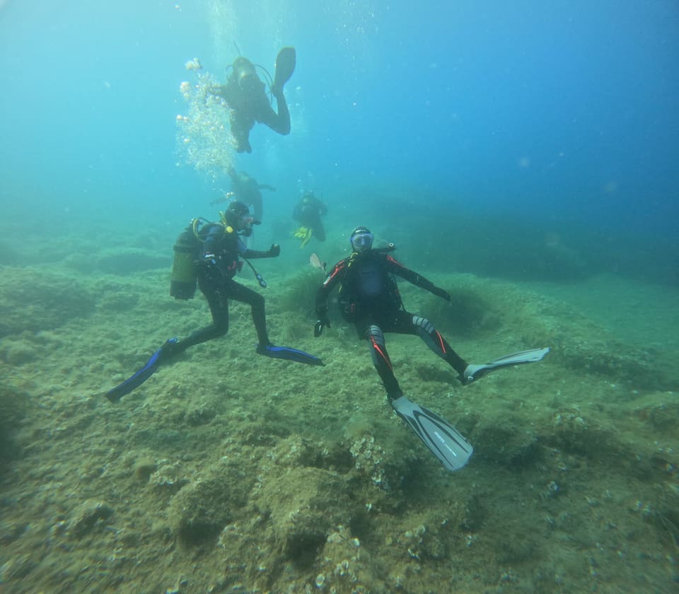 Two divers on the seabed